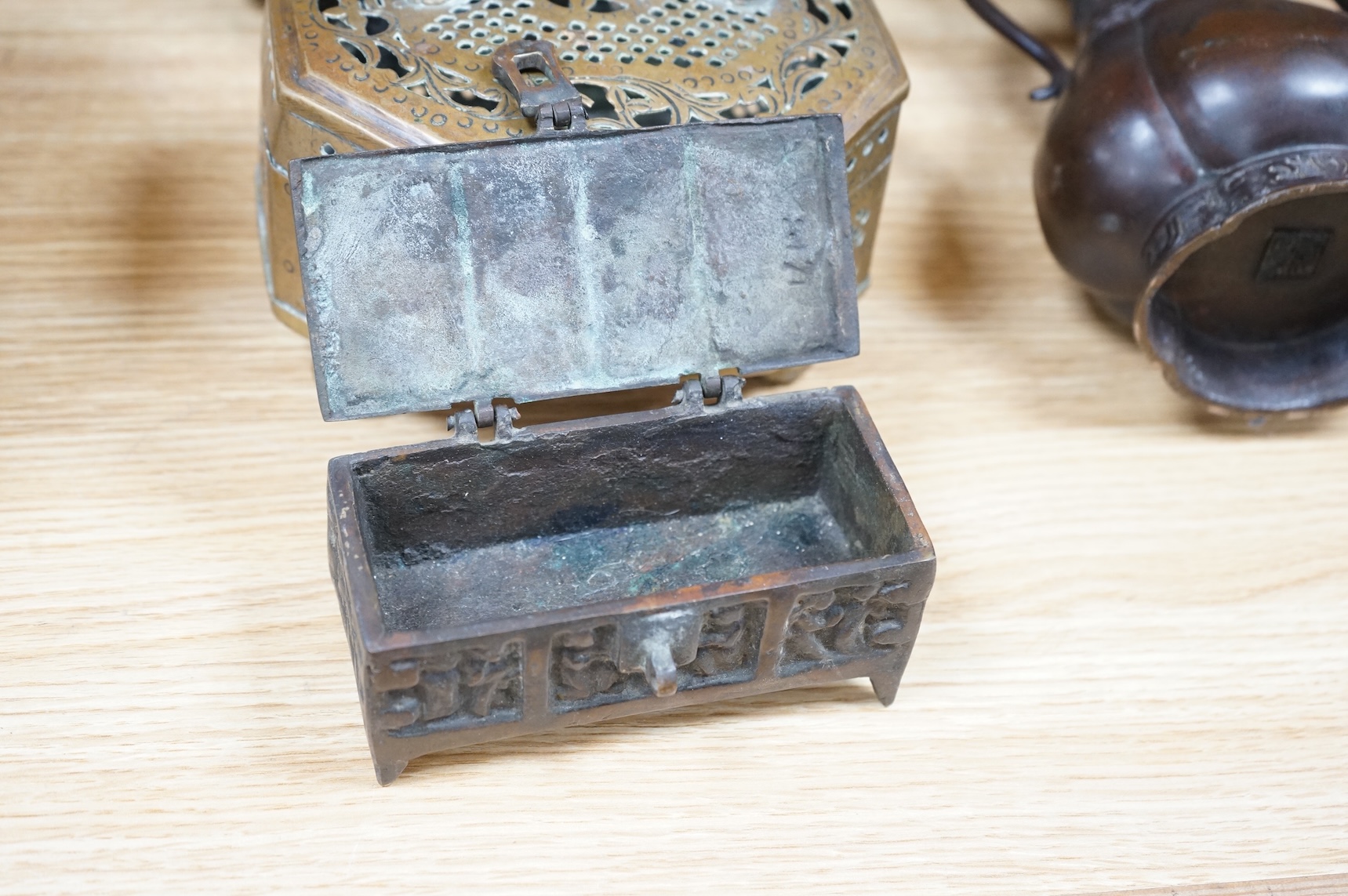 A Japanese archaistic bronze vase, seal mark to base, together with two Indian brass Paan boxes and a Medieval revival bronze casket, tallest 26cm